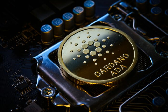 cardano-ada-first-plane-of-a-computer-chip-gold-and-black